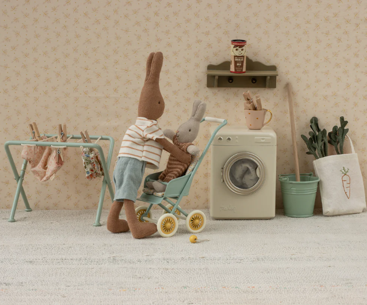 Máquina de lavar roupa em miniatura