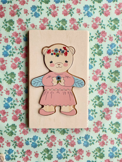 Rompecabezas de madera - Vestir a un osito de peluche