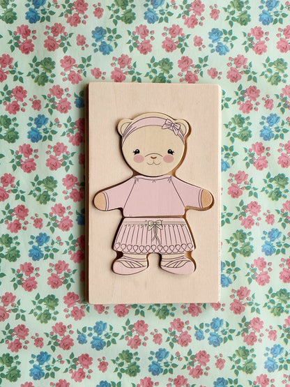Rompecabezas de madera - Vestir a un osito de peluche