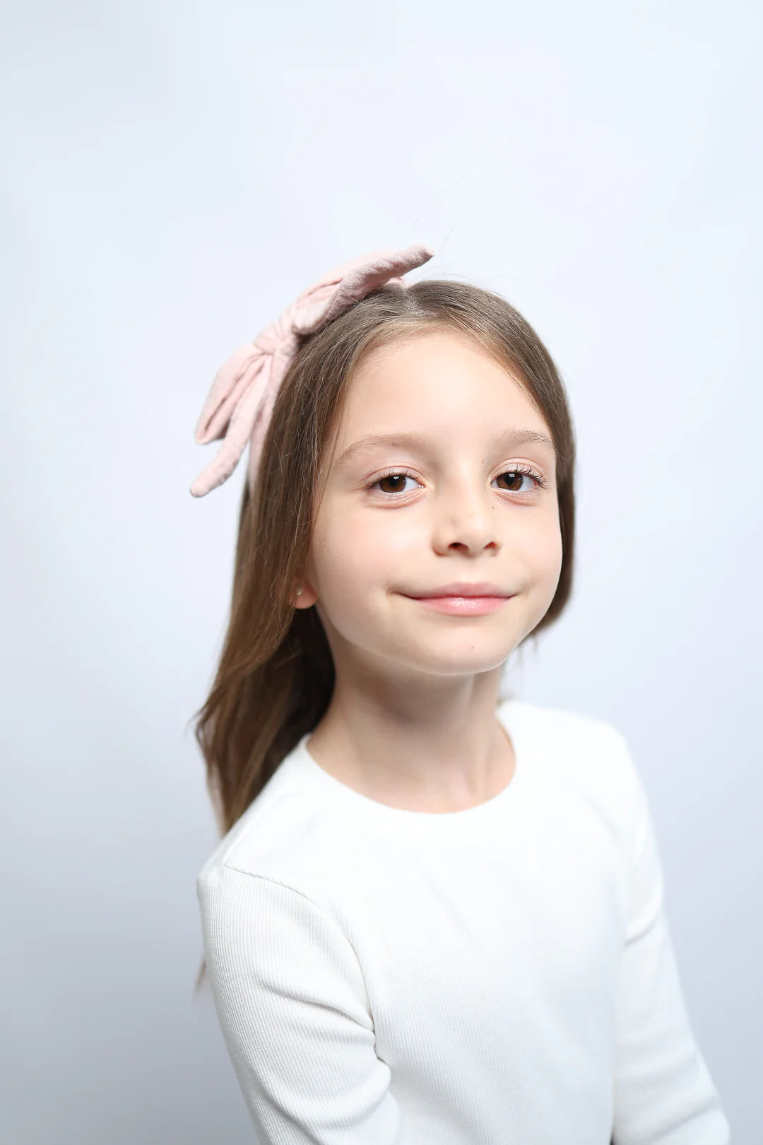 Diadema con lazo rosa